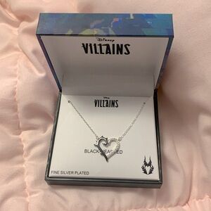 fine silver plated disney necklace,selling to get money for trip.
